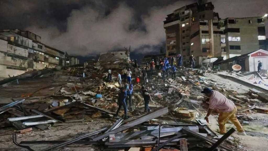 Nighttime rescue scene in a collapsed city block: rubble, damaged buildings, and people searching for survivors.